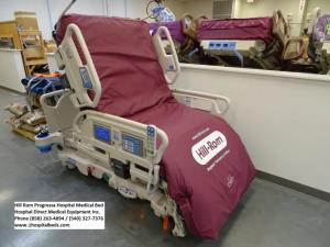 A photo of a HIll Rom P7500 Progressa hospital bed in a full chair position